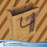 Brown Kraft Paper Packaging Carrier Bag for Shopping/ Gift/ Clothes (XC-bgg-005)