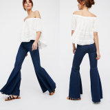 High Rise Jeans Pants Feature a Flared Leg with a Raw Hem