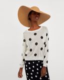 Open Knit Top with a Round Collar and Long Sleeves