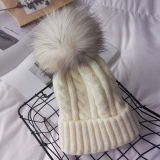 Elegant and Graceful Knitted Hat with Fur Pompom