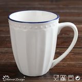 White Porcelain Embossed Blue Rim Mug