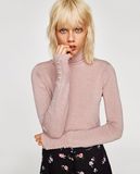 Open Knit Top with a Round Collar and Long Sleeves