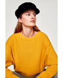 Open Knit Top with a Round Collar and Long Sleeves