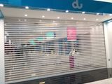 Commercial Shop Transparent Polycarbonate (PC) Rolling Shutter Door/ Roller Shutter Curtain